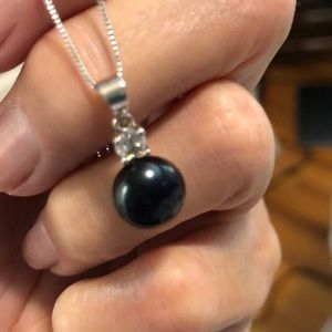 Beautiful genuine black pearl necklace.